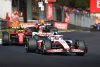AUTODROMO NAZIONALE MONZA, ITALY - SEPTEMBER 11: Kevin Magnussen, Haas VF-22, leads Carlos Sainz, Ferrari F1-75, and Sergio Perez, Red Bull Racing RB18 during the Italian GP at Autodromo Nazionale Monza on Sunday September 11, 2022 in Monza, Italy. (Photo by Mark Sutton / LAT Images)